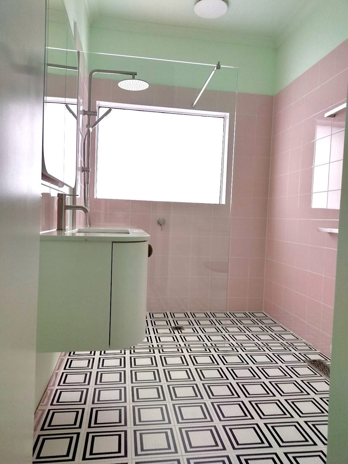 Finished Altona North bathroom renovation with walk-in shower and pink tiles
