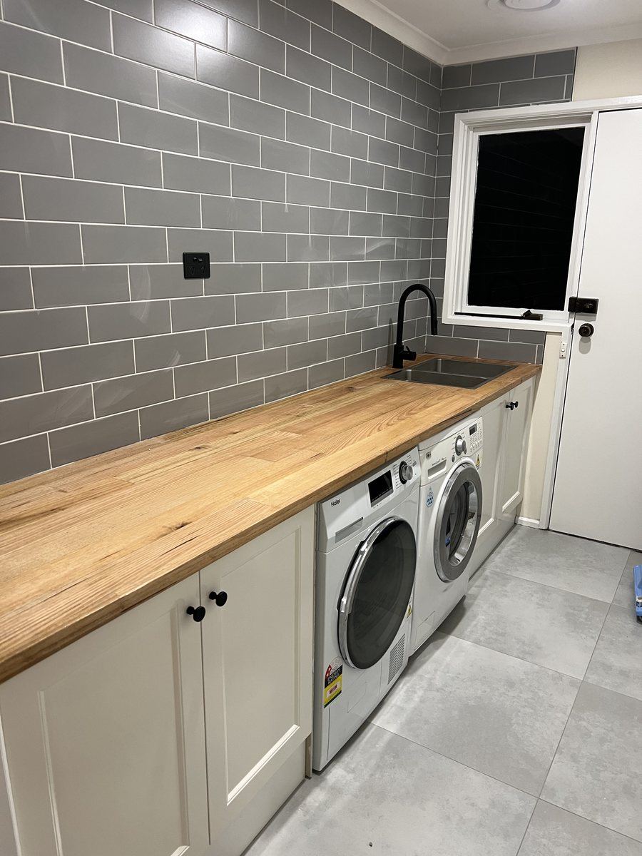 Laundry renovation with timber benchtop